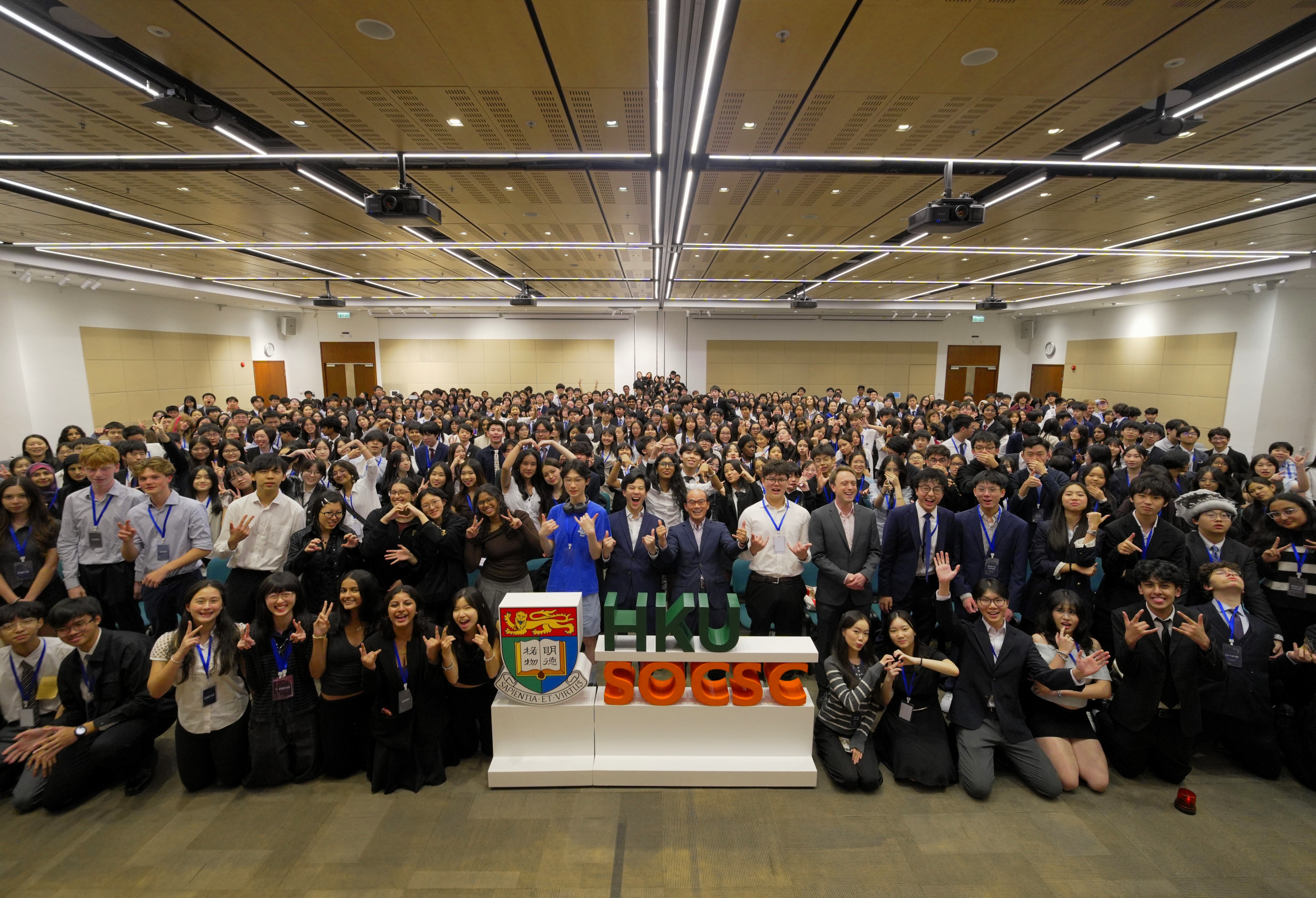 The University of Hong Kong Centennial Campus at dusk — venue of ICEMUN 2026, a Model United Nations conference in Hong Kong
